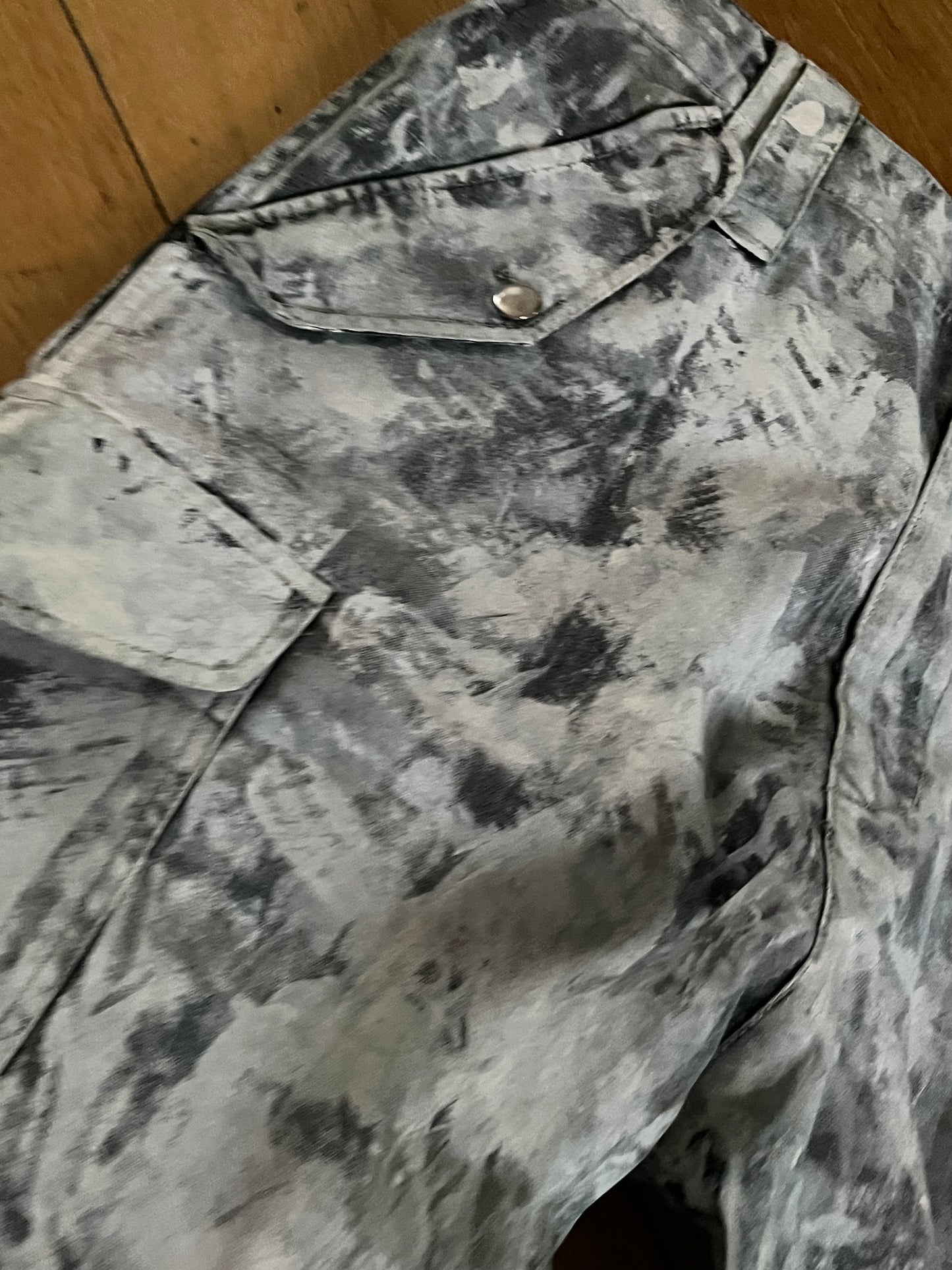 “PAINTED CAMO SHORTS”