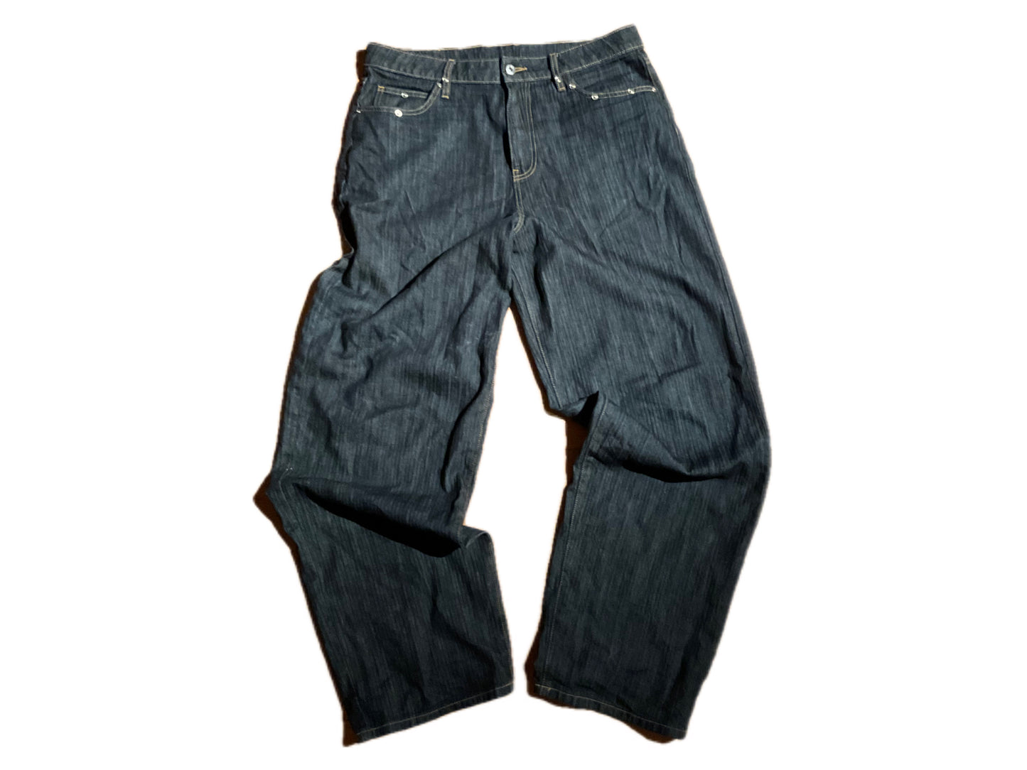“STUDDED RAW DENIM”