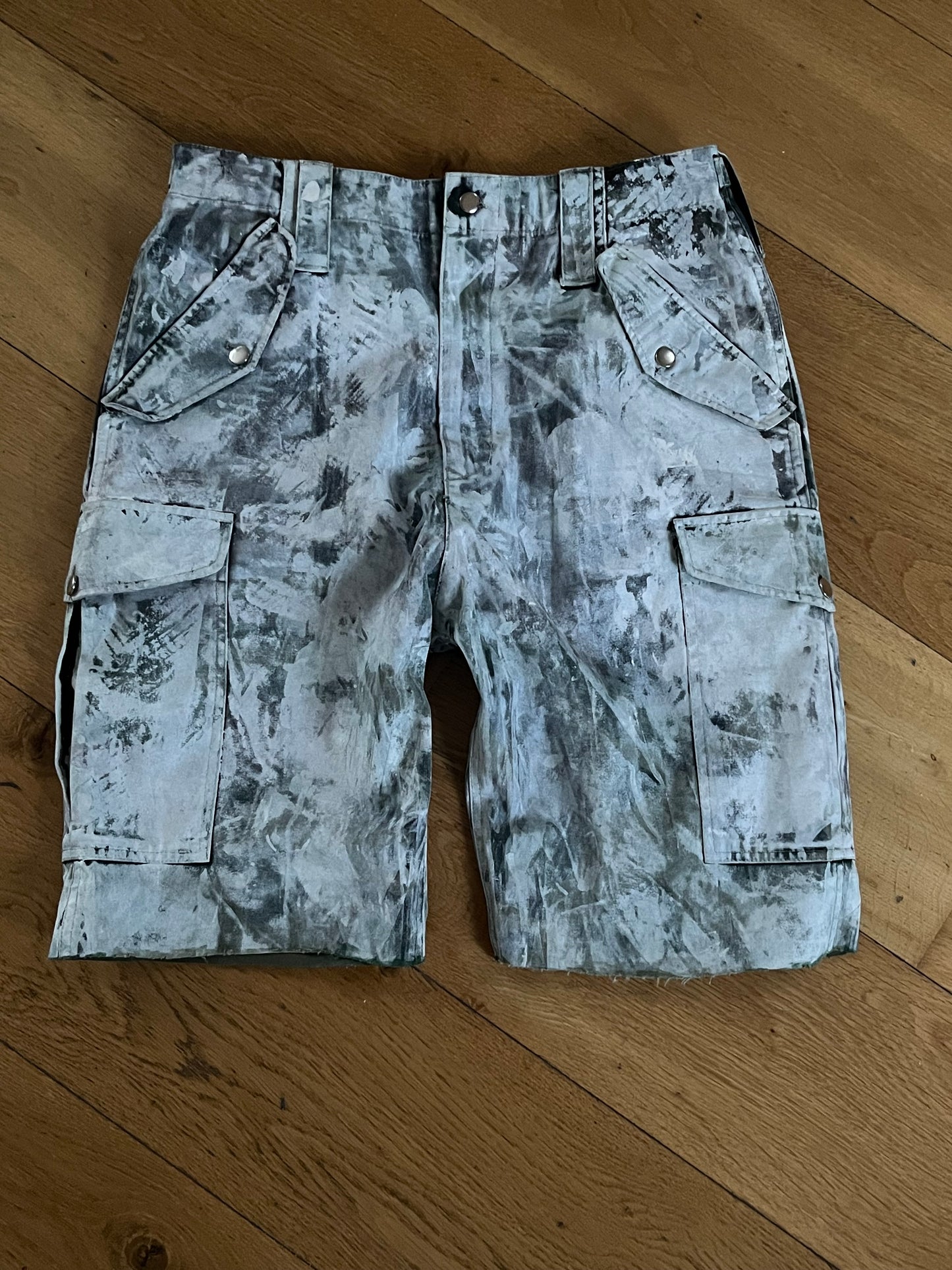 “PAINTED CAMO SHORTS”